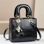Serpentine Tassel Crossbody Bag